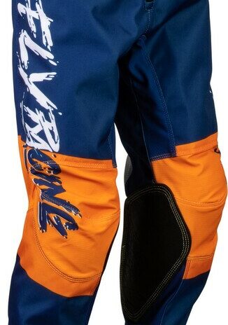 Pantalon FLY RACING Kinetic Khaos Blanc/Navy/Orange Enfant 18